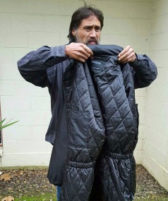 Rough sleeper Shaun Farrell has an extra layer to keep him warm thanks to one of 100 coats gifted to the homeless in Auckland by the NSW branch of the Order of Malta.
