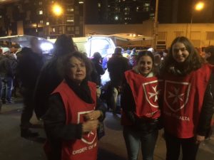 Member of the Order Lilian Antonelli, with volunteers Lauren and Lyn from Newman College, distributing Coats to the homeless in Melbourne