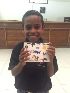 Natalino with a thank you card he designed for his sponsor