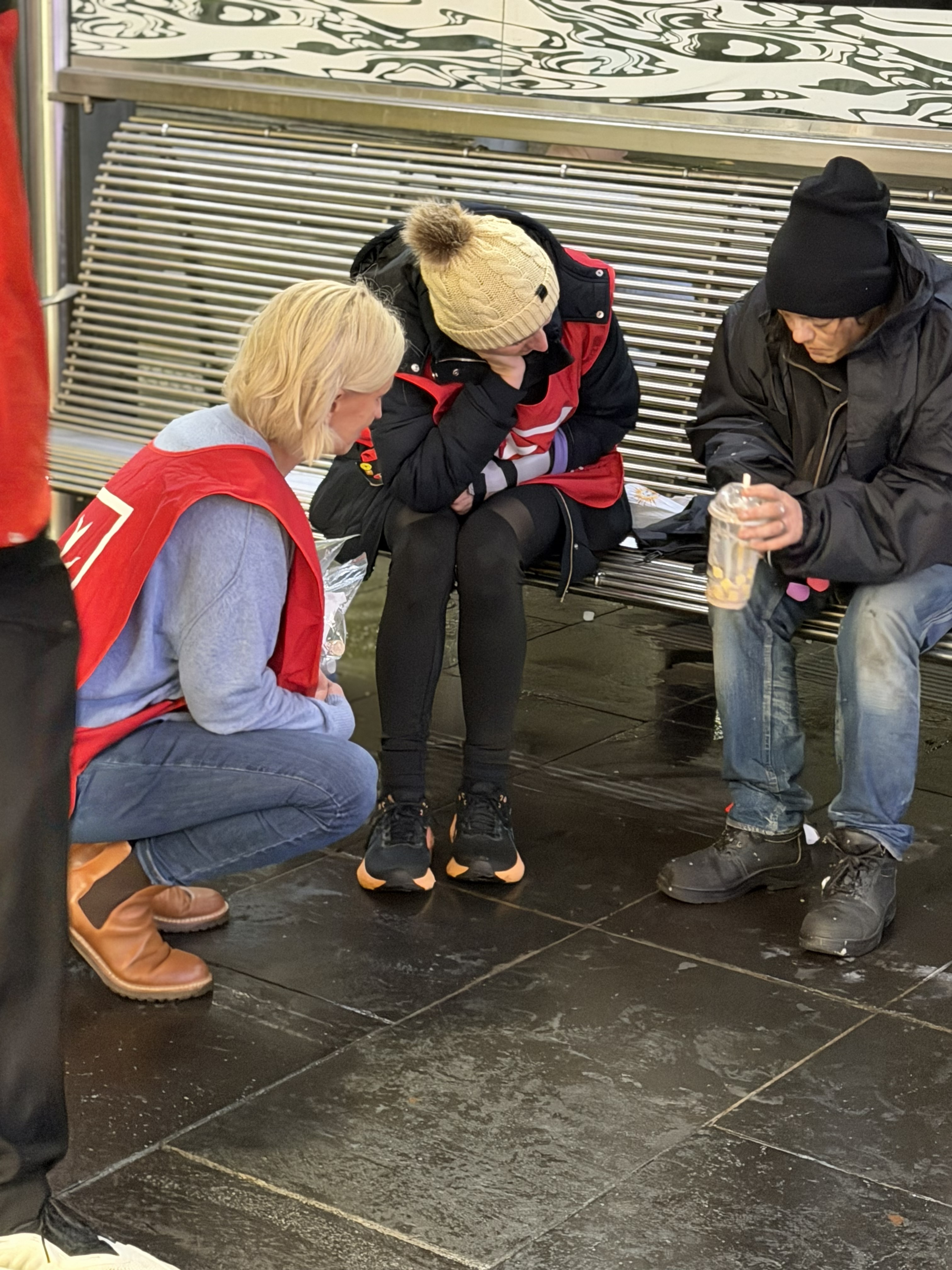 Homeless with volunteers